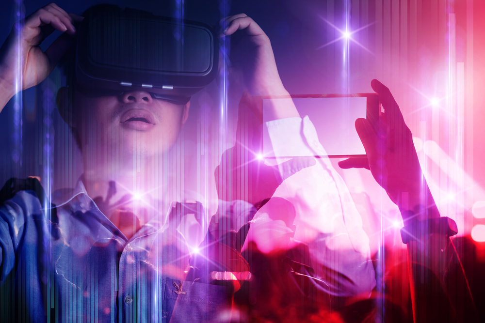 Young man with VR headset watching virtual contert for Music Streaming Platform Trends - How They Impact Artists article