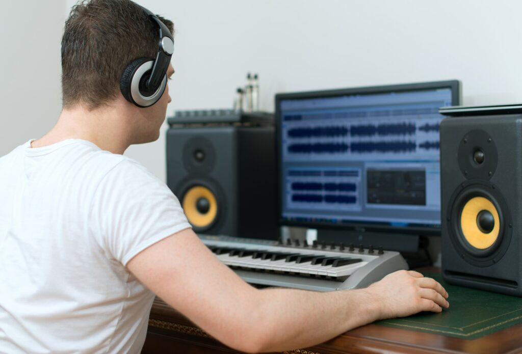 Musician in home recording studio for Sound Engineering Software - Our Top Picks For Musicians article