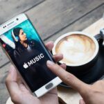 Mobile phone with Apple Music logo for Apple Music pay per stream article