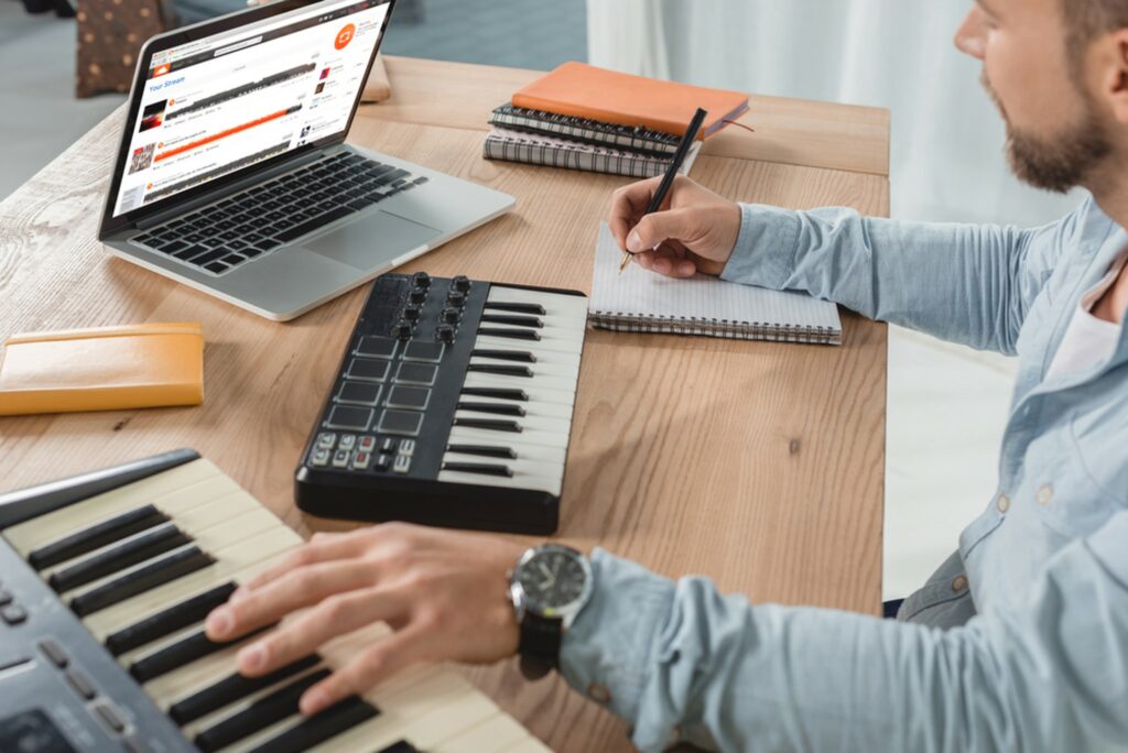 Musician working out the soundcloud pay per stream
