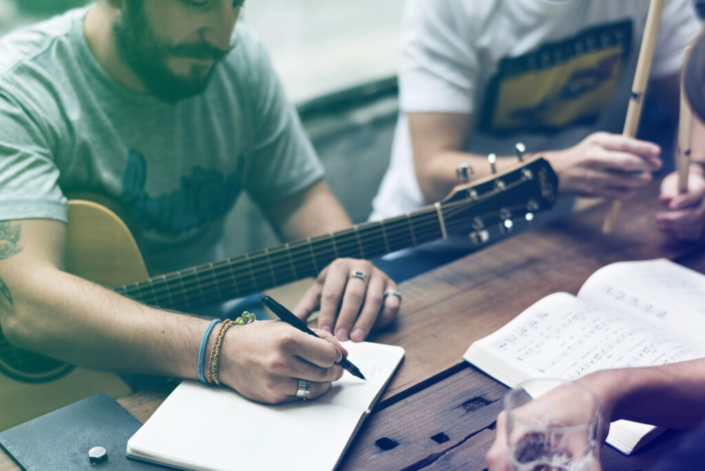 Musicians working together: Second image in micro-sync royalties article.