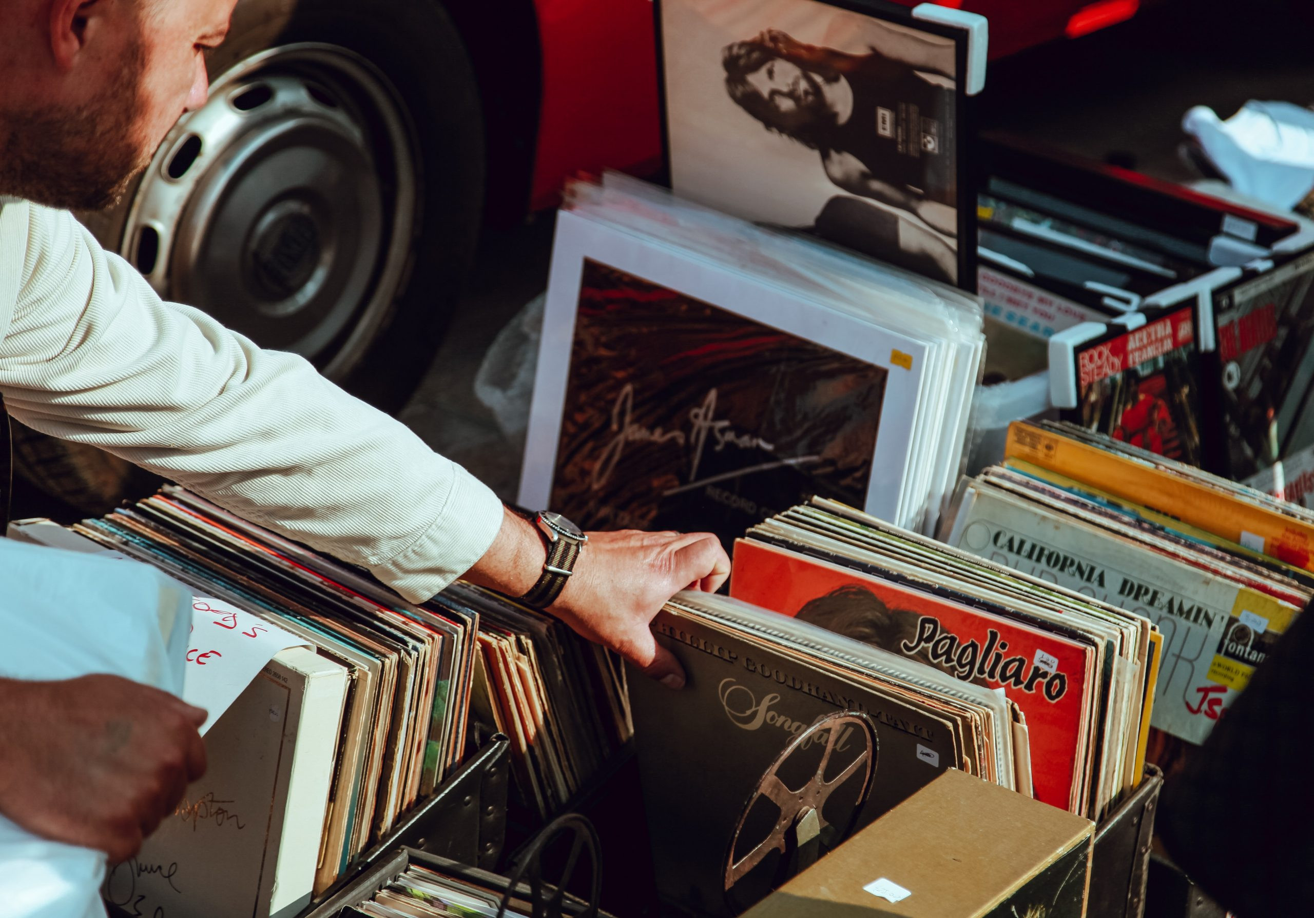 musician reviewing music collection for music distribution companies