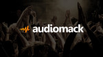Audiomack logo with crowd at a concert in the background